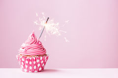 pink-cupcake-sparkler-decorated-49510484
